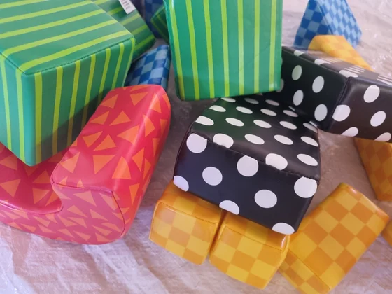 Soft building blocks with colourful stripes, checks and spots